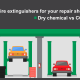 Animated graphic showing a car repair shop and fire extinguishers mounted in the repair bays
